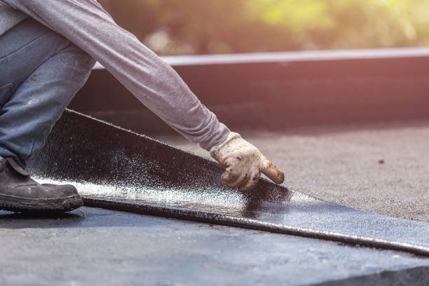 Professional Waterproofing technician working in North Babylon, NY